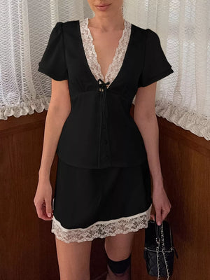 Black mini dress with mini and tie, button-front