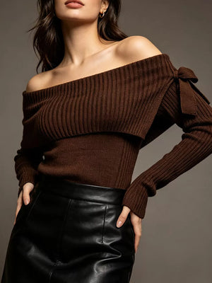 Black off-shoulder top featuring ribbed and ribbed