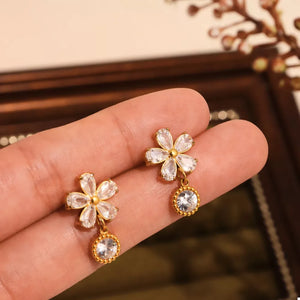 18K Gold-Plated, Stainless Steel, Zircon Care instructions: Avoid wearing during earrings in Gold with drop silhouette