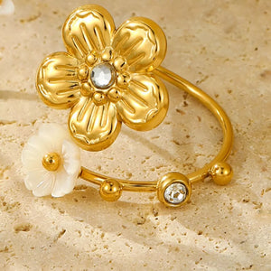 Gold ring featuring adjustable and floral