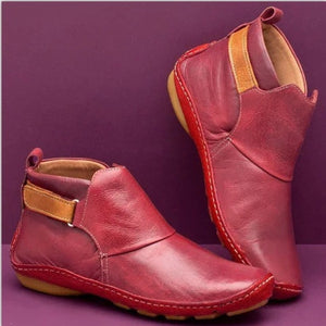 ankle boots in burgundy featuring contrast strap and relaxed fit