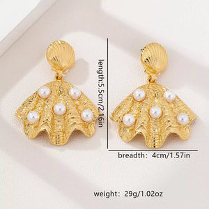 earrings in ivory with shell design and 2.2 inches