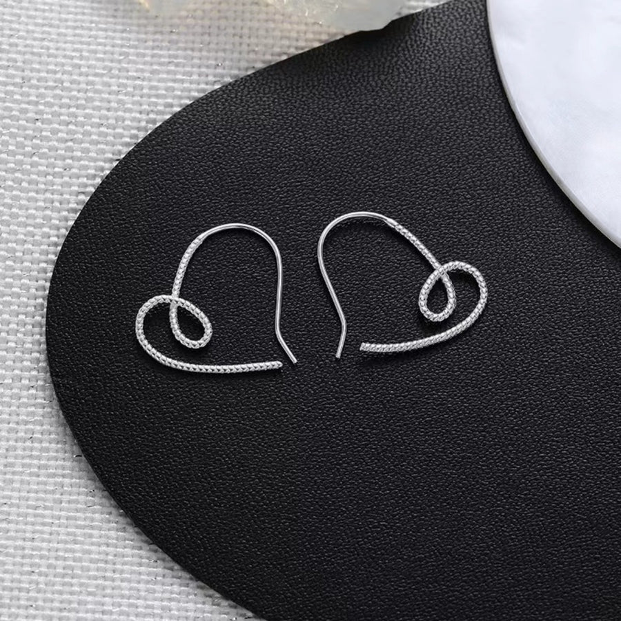 925 sterling silver Care instructions: Avoid wearing during exercise, as sweat w earrings in Silver with dangle silhouette