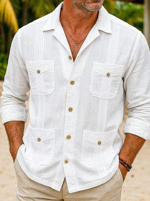 Men's white long sleeve button-up shirt with four pockets and pintuck details.