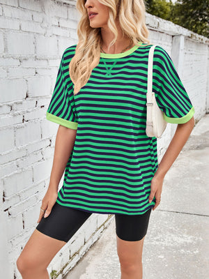Green and navy striped Breton tee with light green trim and neckline detail.