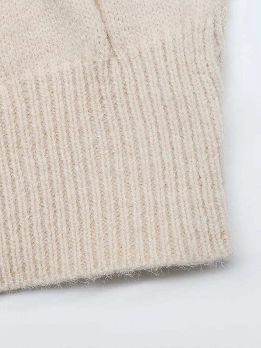light beige sweater dress with pullover and cable knit