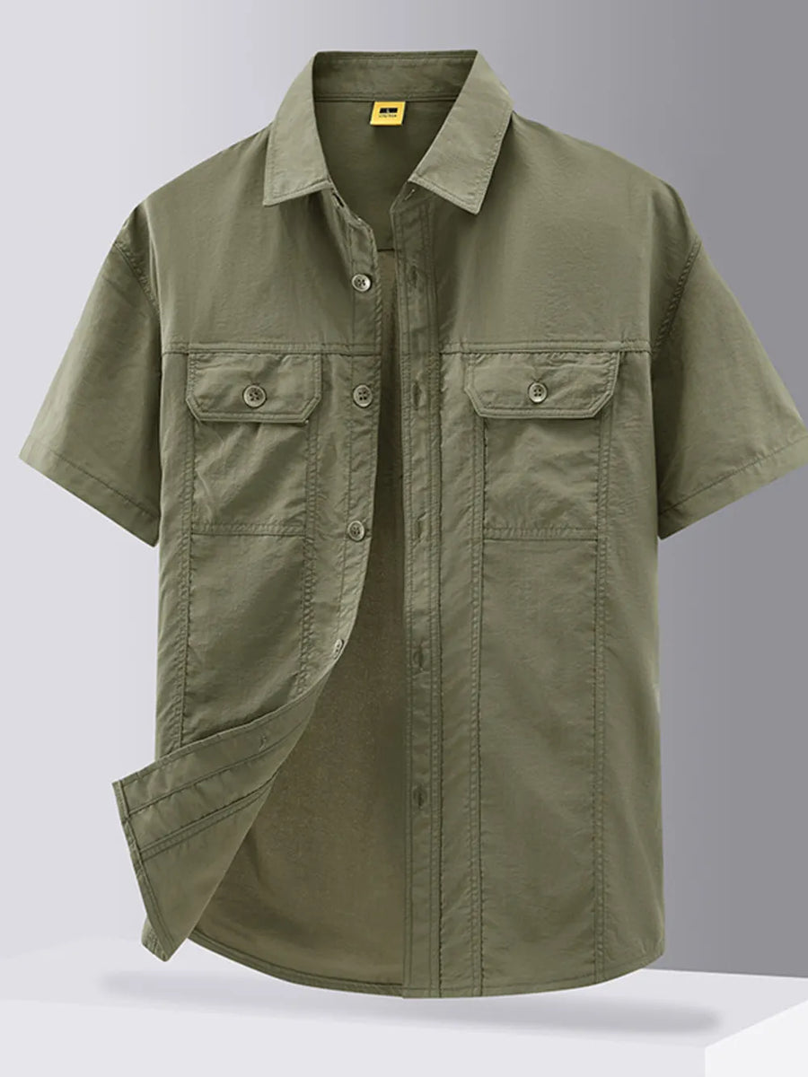Men's short sleeve button-down shirt in military green with two chest pockets.
