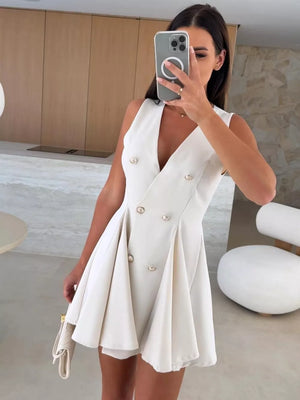 Beige double-breasted mini dress with gold buttons and pleated skirt
