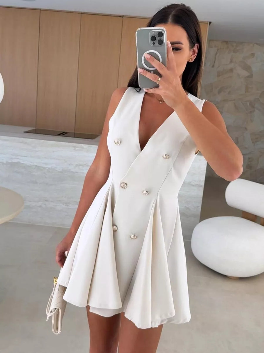Beige double-breasted mini dress with gold buttons and pleated skirt