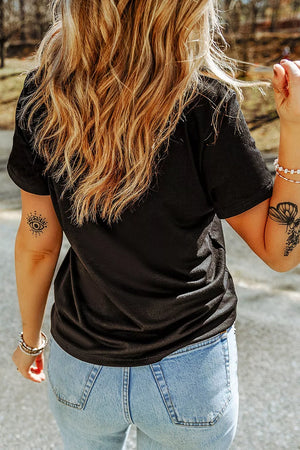 cream t-shirt featuring short sleeve and applique