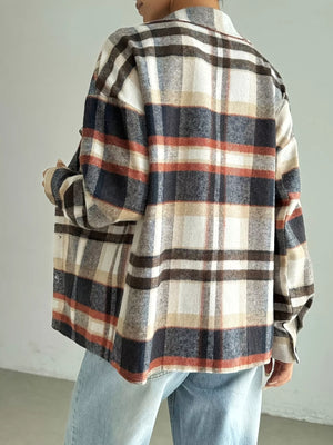 Relaxed fit plaid shirt jacket in mocha with button front and classic collar.