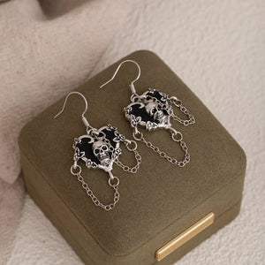 Zinc alloy,Stainless Steel,Silver-plated Care instructions: Avoid wearing during earrings in Silver with dangle silhouette