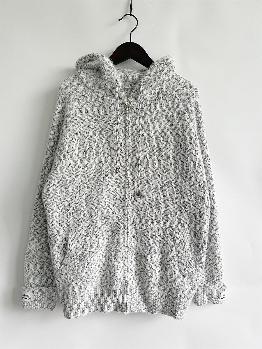 Speckled knit relaxed zip-up hoodie in white with a geometric pattern and drawstring hood.