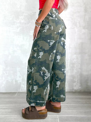 50%cotton, 50%spandex Care instructions: Machine wash cold wide-leg jeans in sage green with flared silhouette