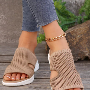 Khaki open-toe mesh sandals with white soles and a gold chain anklet.