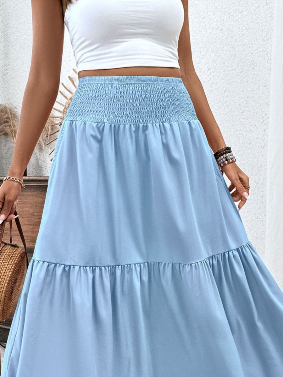 Light blue ruffled smocked waist maxi skirt with tiered hem