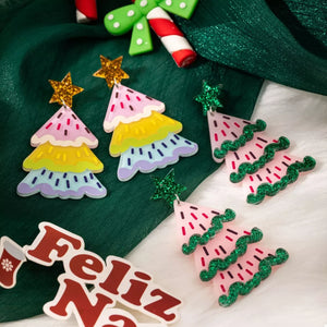 green earrings featuring dangle and novelty