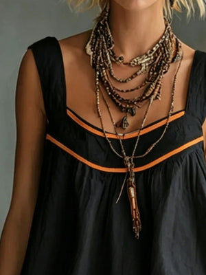 100% polyester Care instructions: Machine wash cold mini dress in Black with A-line silhouette