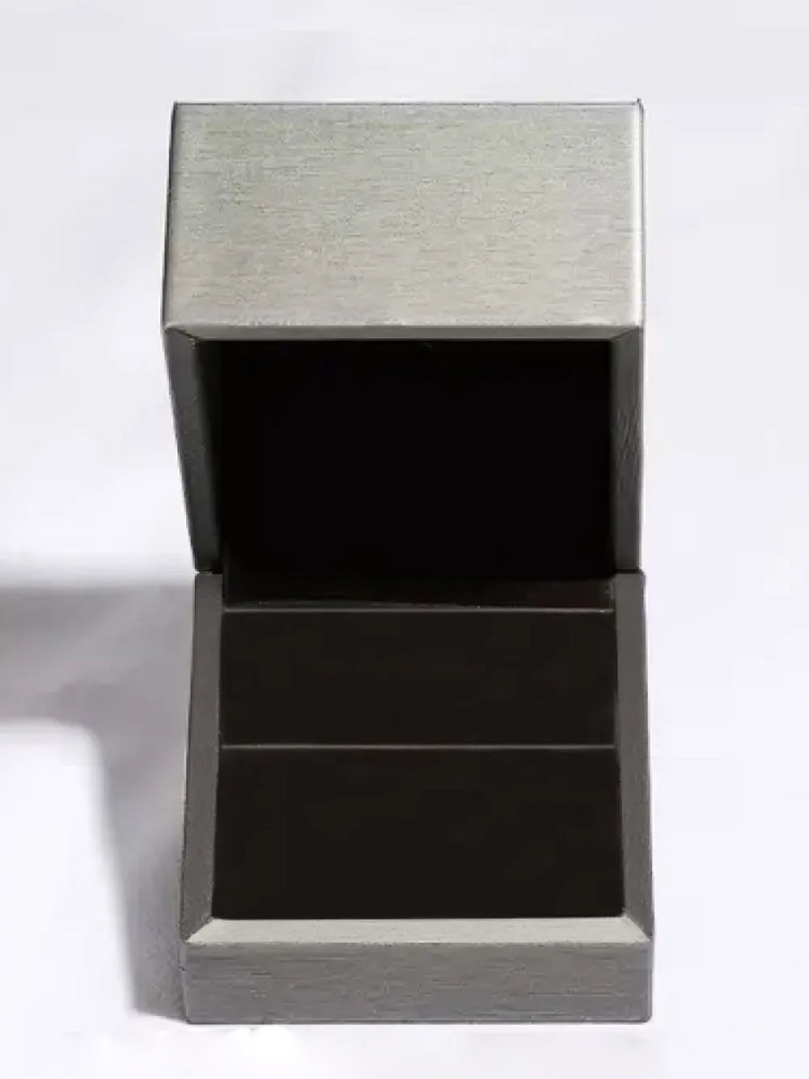 Open grey ring box with black interior