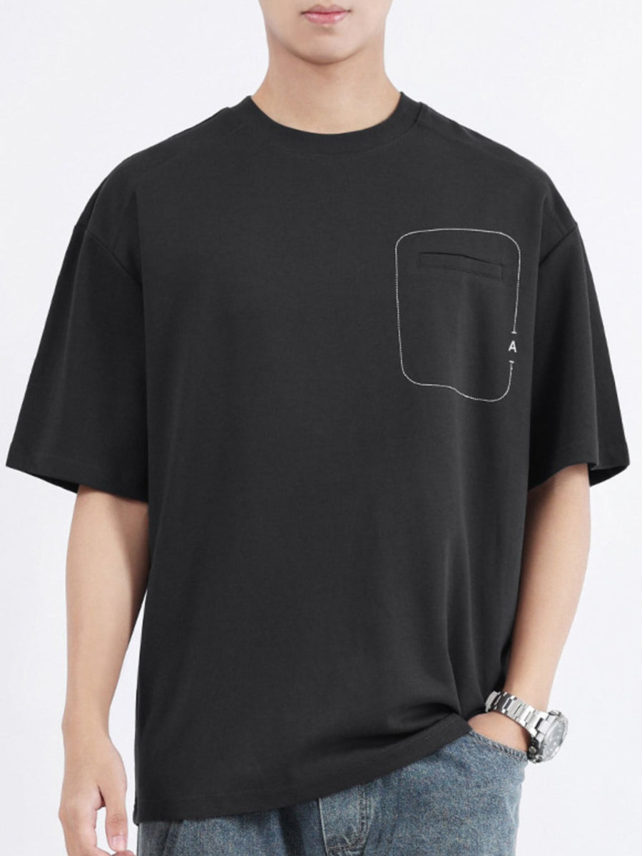 Black cotton crew neck t-shirt with decorative pocket detail and half sleeves.