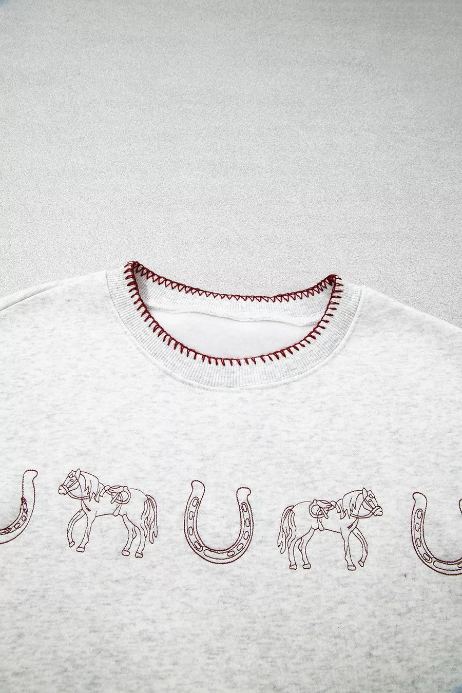 heather gray sweatshirt with ribbed hem and long sleeve