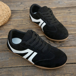 sneakers in black with color-block and round toe