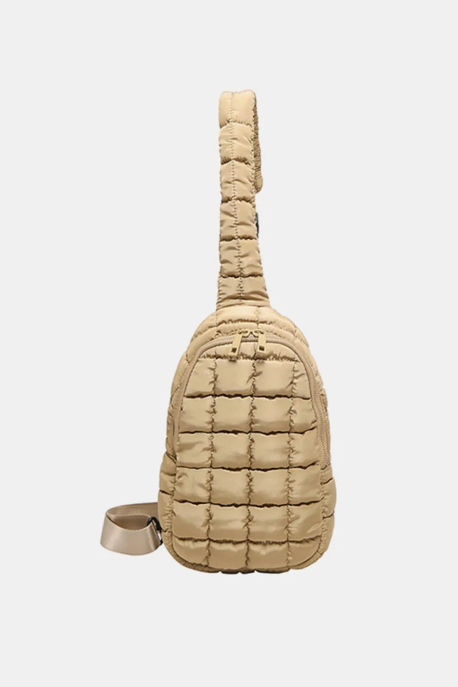 Padded sling bag in Camel with top handle and adjustable strap.