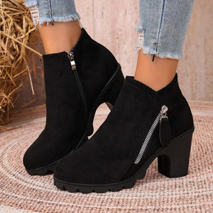 boots in black featuring block heel and ankle boot fit