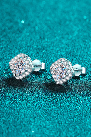 Square halo moissanite stud earrings in silver with a halo of small stones.