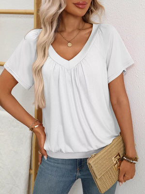 White ruched V-neck t-shirt with banded hem and short sleeves.