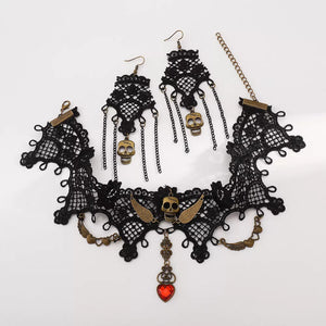necklace in antique gold with skull motif and 3-piece set