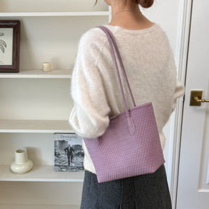 handbag in lavender featuring woven texture and boxy fit