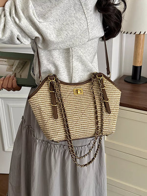 dark brown crossbody bag featuring woven texture and geometric