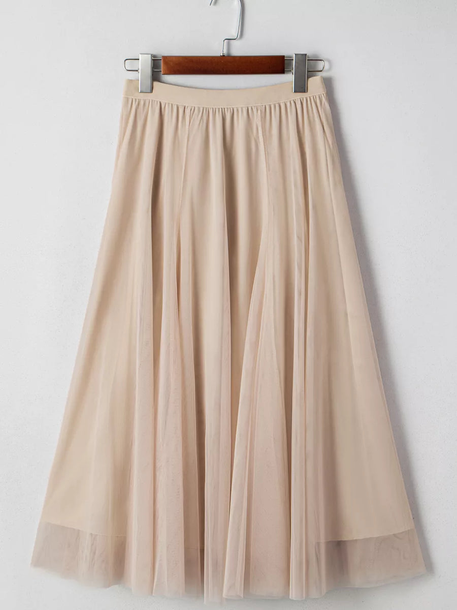 Lace overlay flared midi skirt in beige with a sheer hem detail.