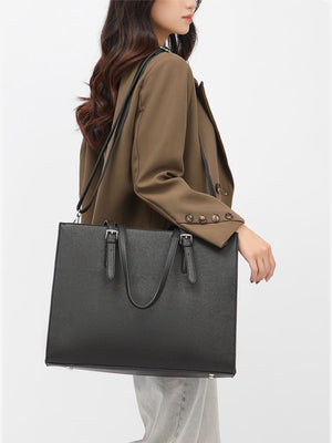 tote in black featuring structured and boxy fit