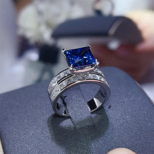 Platinum-Plated,925 sterling silver,Moissanite,Zircon (accent stones) Carat weig ring in Royal Blue with band silhouette