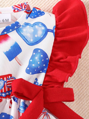 Baby one-piece with patriotic print, red ruffle sleeves, and a red bow detail.