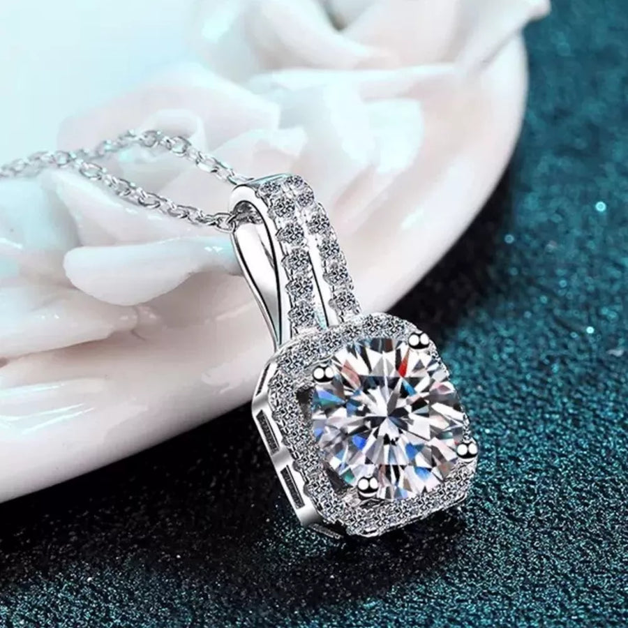 925 sterling silver,Moissanite Carat weight: 5ct Care instructions: Avoid wearin necklace in clear with delicate silhouette
