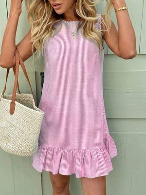 white mini dress featuring ruffled and striped