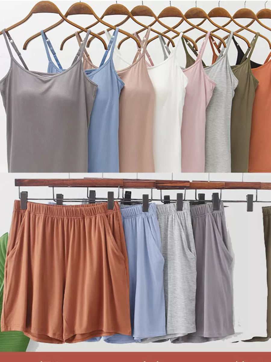 Pajama set with adjustable strap cami and elastic waist shorts in multiple colors.