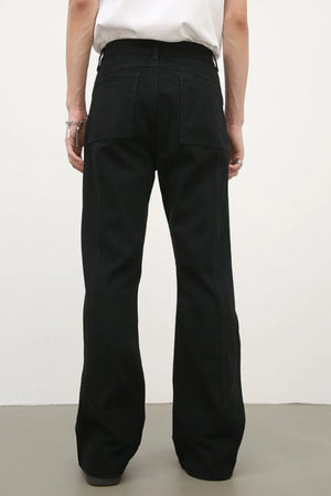 Black flare jeans with panel seams and a casual fit.