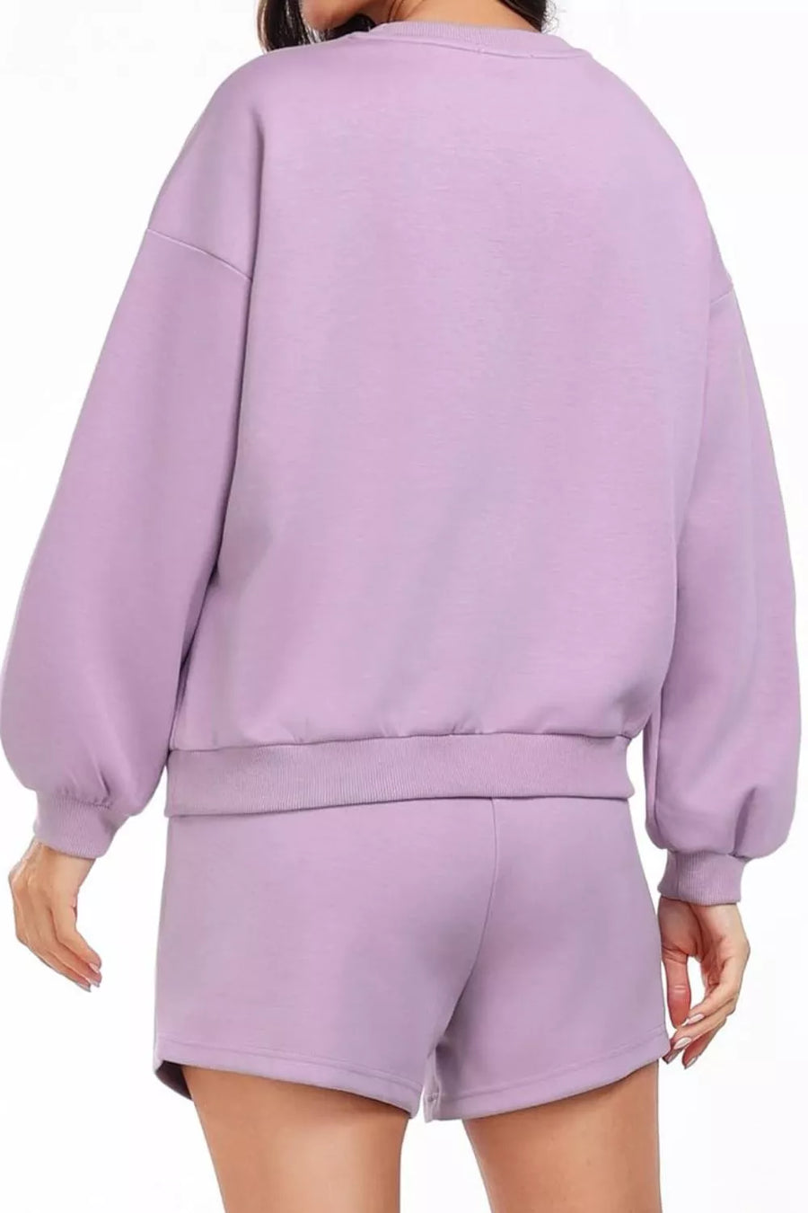 Cozy two-piece sweatshirt set in Pink Purple with balloon sleeves and drawstring shorts.