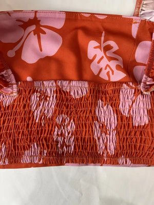Orange and pink floral print ruffled crop top with smocked waist detail