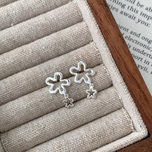 earrings in Silver with floral and drop design