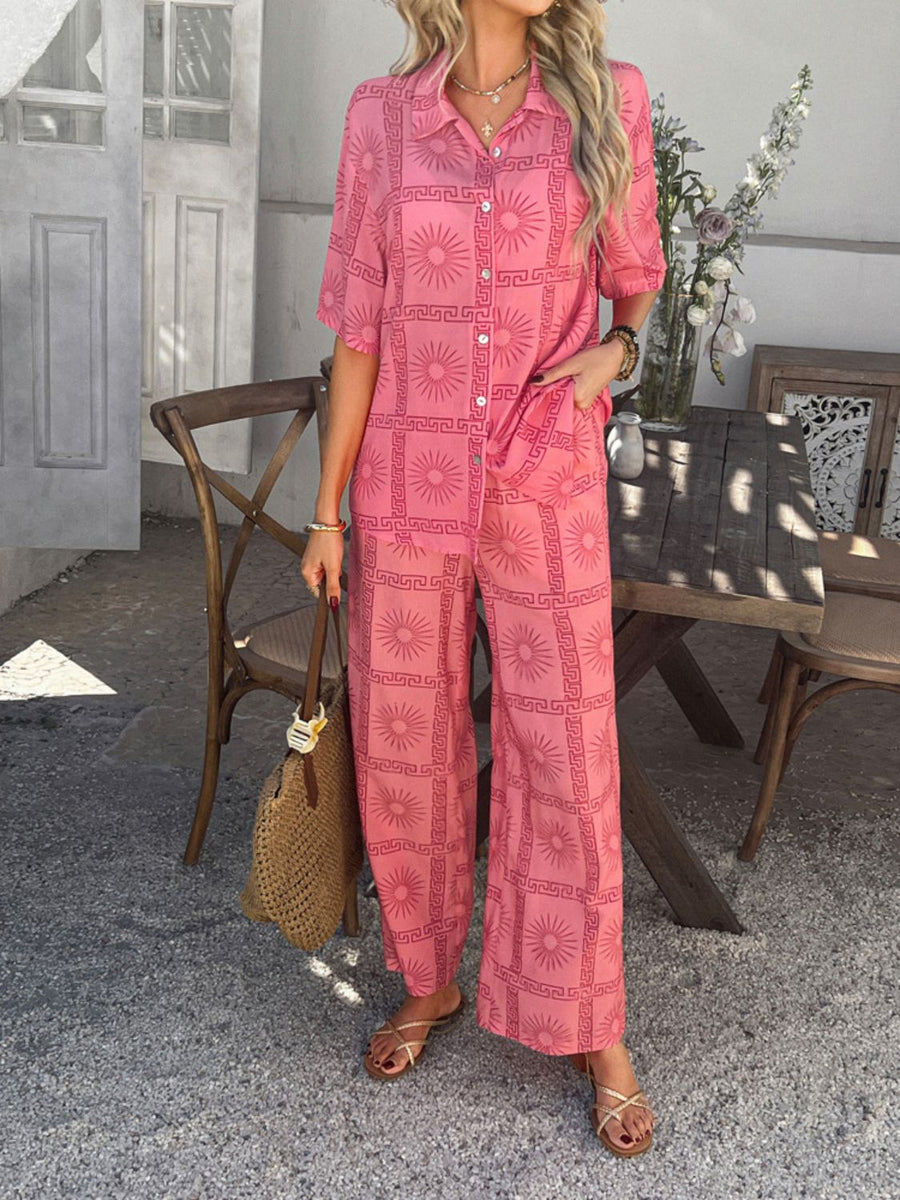 Women's pink abstract print resort co-ord set with button-up shirt and wide-leg pants.