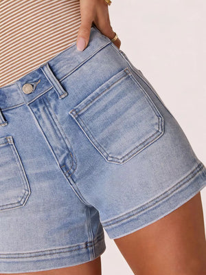 Light blue denim shorts with high waist and utility pockets.