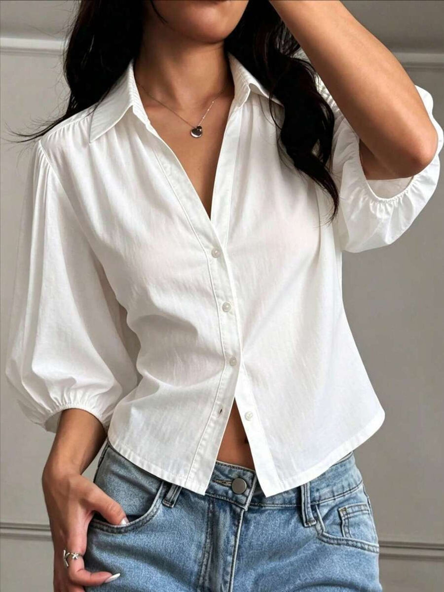 button-down shirt in white featuring buttoned and relaxed fit