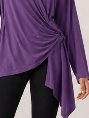 100% polyester Care instructions: Machine wash cold wrap top in Black with relaxed silhouette