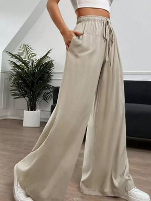 100% polyester Care instructions: Machine wash cold wide-leg pants in Apricot with wide-leg silhouette