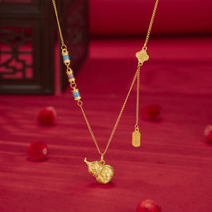 necklace in gold featuring gourd pendant and N/A fit